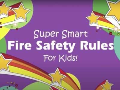 A colorful banner with a purple background featuring yellow stars and rainbows. The text in the center reads, "Super Smart Fire Safety Rules For Kids!" The corners are adorned with star and firework graphics.