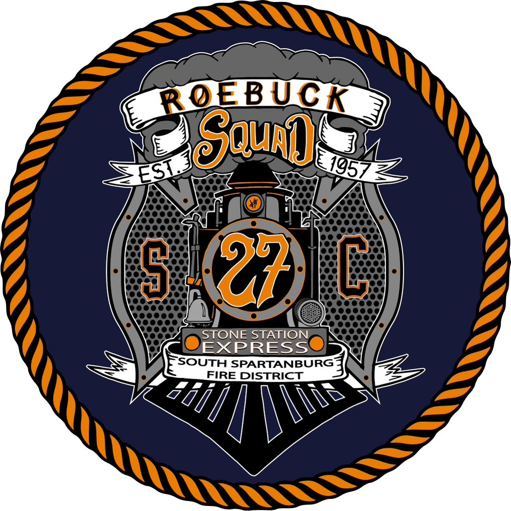 A circular emblem with a navy background and rope border. It features a central locomotive graphic with "Squad" and "27." Text includes "Roebuck Squad," "Est 1957," "Stone Station Express," "South Spartanburg Fire District," and "S C.